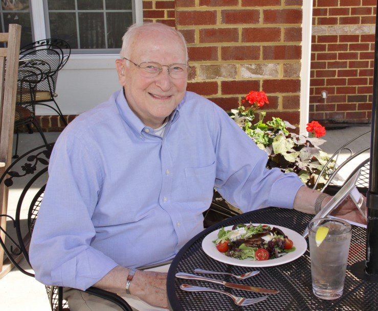 Mr.-Mullen-e1422583737629 a man sitting at a table